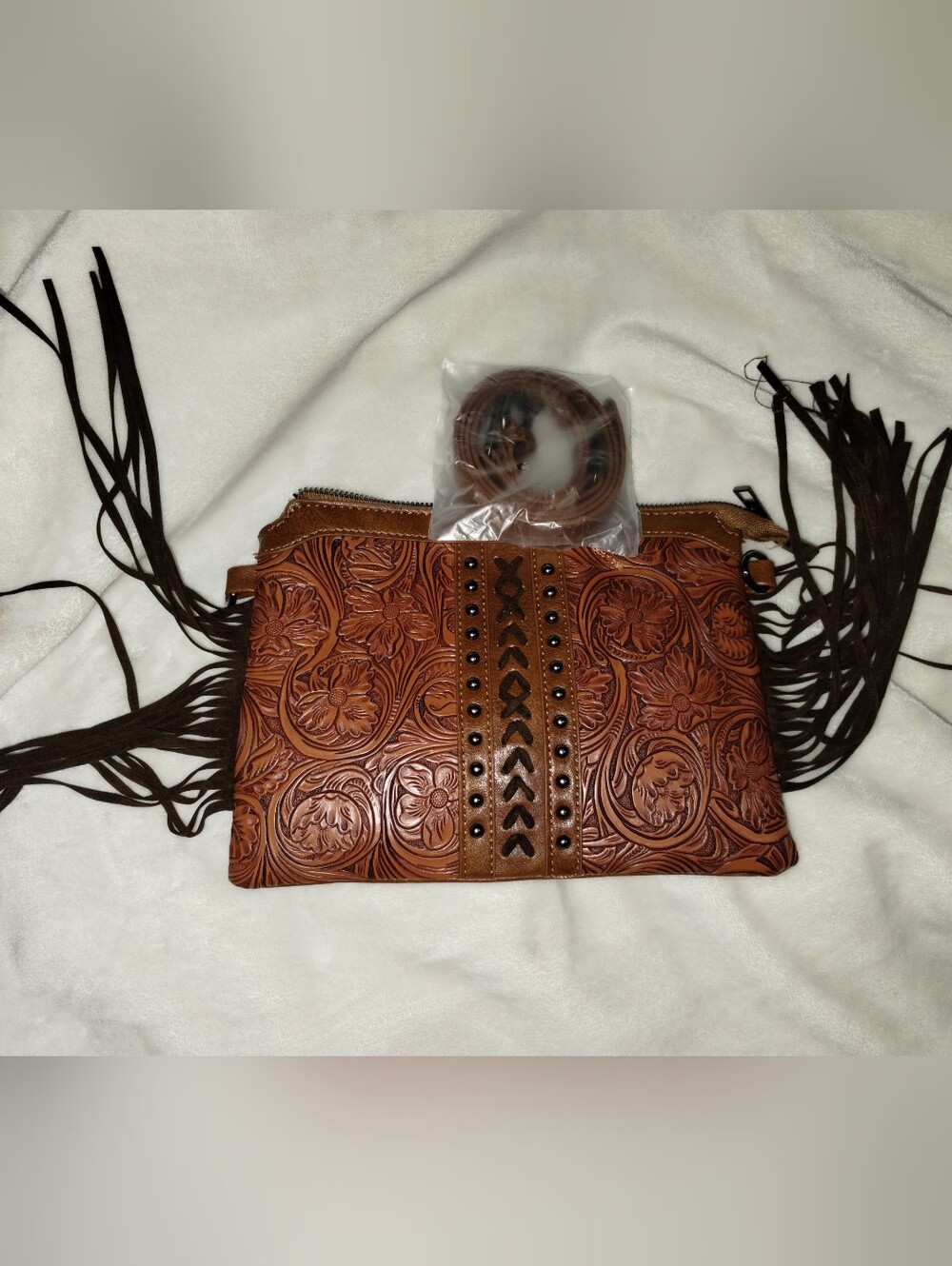 Hand-Tooled Brown Leather Crossbody Bag with Fringe and Stud Detail